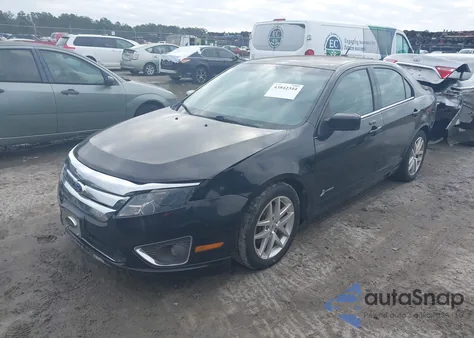 2012 Ford Fusion Hybrid из США, поврежденный, VIN 3FADP0L32CR157817